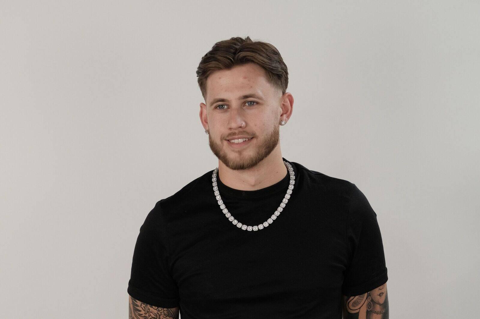 Sam, barber and Studio M co-founder